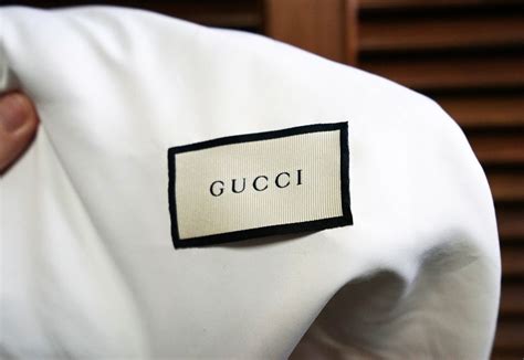 real and fake gucci logo|authentic gucci clothing tags.